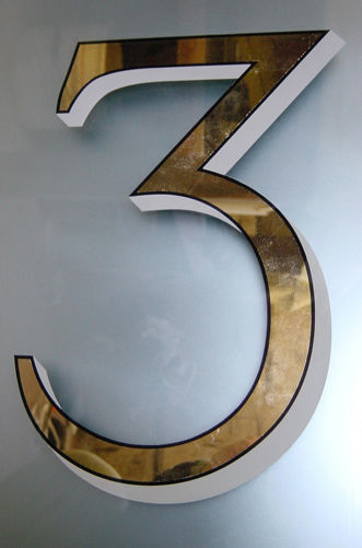number writting in gold leaf